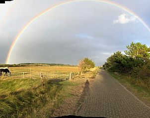 Schner Regenbogen ber der Natur beim Ferienhaus in Buren Ameland.