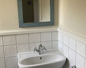 Trap naar bovenverdieping in Beppe van Ameland vakantiehuis, Hollum, Ameland.