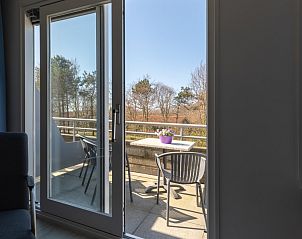 Privterras met uitzicht op natuur in Amelander Kaap 126, Hollum, Ameland.