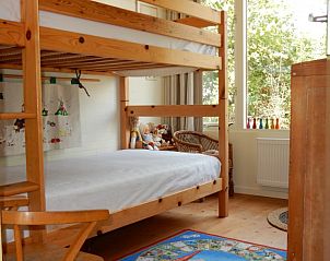 Kinderkamer met stapelbed in Buutvrij vakantiehuis op Schiermonnikoog.