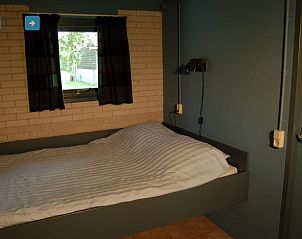 Rustgevende slaapkamer in vakantiehuis Afke, Schiermonnikoog, voor een goede nachtrust op de Waddeneilanden.