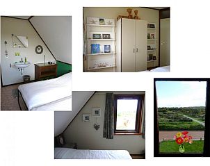 Lichte slaapkamer in Casa Maris, Schiermonnikoog, met uitzicht op duinen en moderne inrichting.