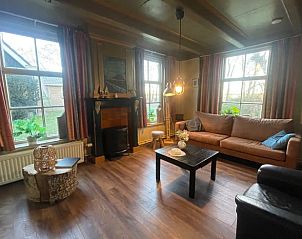 Wohnzimmer in Haus in Schiermonnikoog, Ferienhaus auf Schiermonnikoog mit Holzbden.