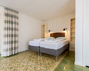 Guest house 450357 - Holiday property Noordzeekust - Zomerhuisjes de Bels