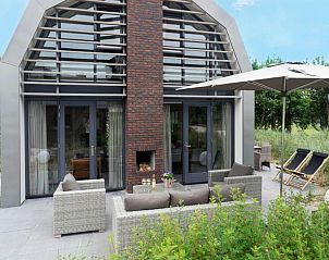 Guest house 451299 - Holiday property Noordzeekust - Zicht op de Molen