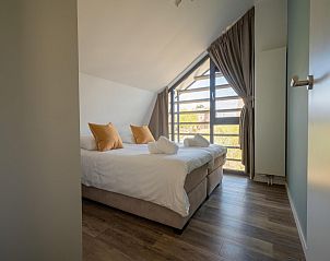 Guest house 451299 - Holiday property Noordzeekust - Zicht op de Molen