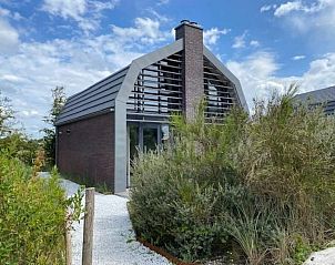Guest house 451299 - Holiday property Noordzeekust - Zicht op de Molen