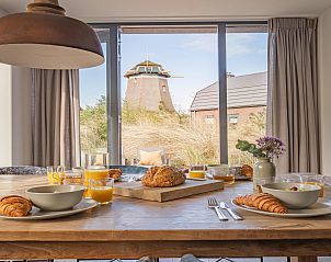 Guest house 451299 - Holiday property Noordzeekust - Zicht op de Molen