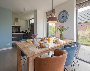 Guest house 451299 - Holiday property Noordzeekust - Zicht op de Molen