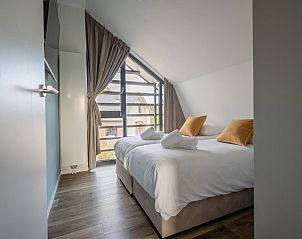 Guest house 451299 - Holiday property Noordzeekust - Zicht op de Molen