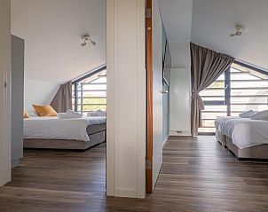 Guest house 451299 - Holiday property Noordzeekust - Zicht op de Molen