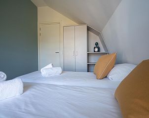 Guest house 451299 - Holiday property Noordzeekust - Zicht op de Molen