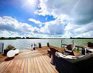 Guest house 460142 - Holiday property IJsselmeerkust - Vakantiehuis direkt am See