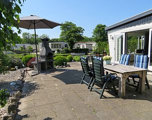 Guest house 490326 - Holiday property IJsselmeerkust - huisje 143, bootje, aan het water, grote tuin en terrassen